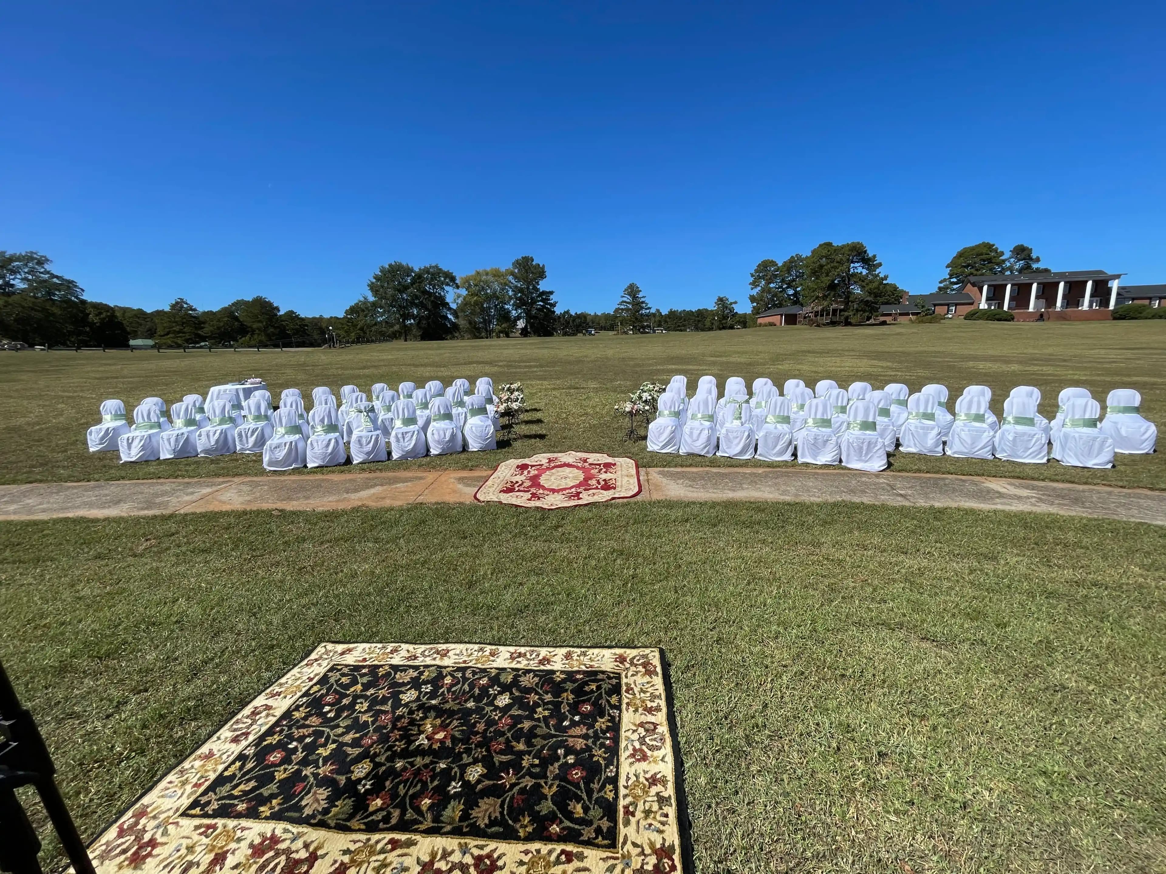 Bohemian wedding theme with covered chairs and rustic elements