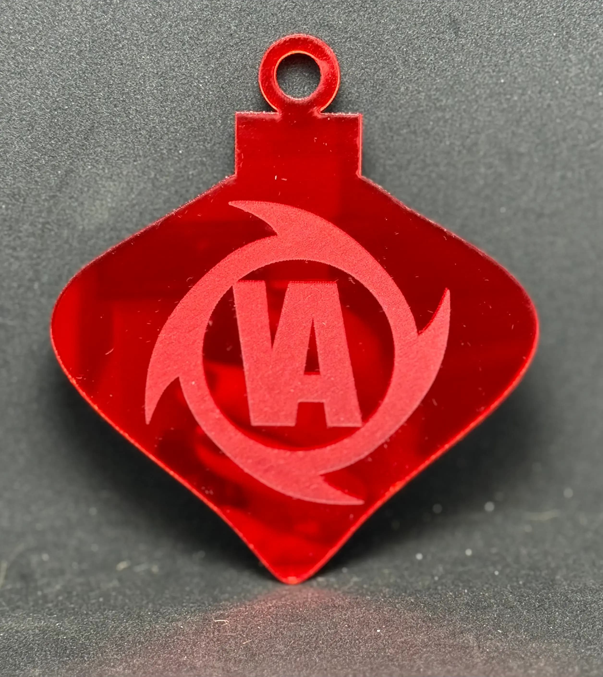 Custom red acrylic ornament with Voigt Abernathy company logo