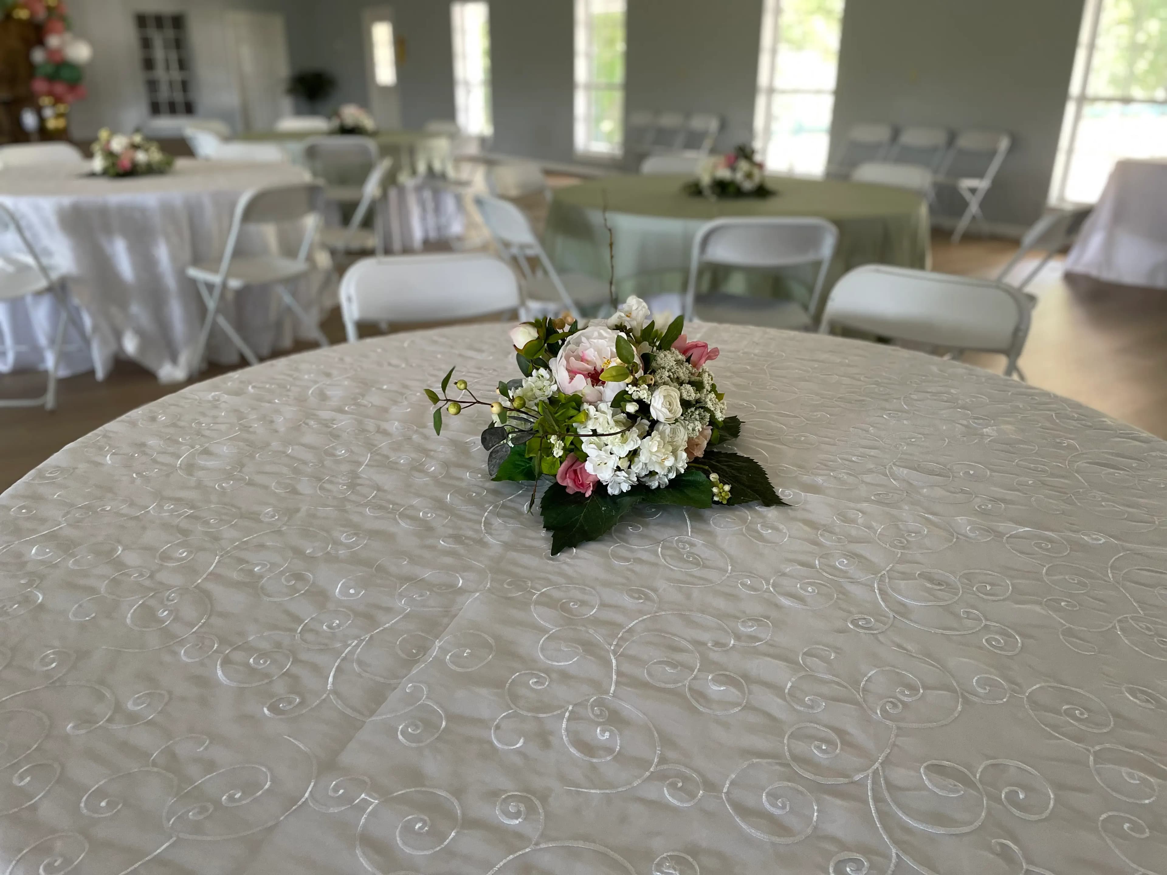 Elegant White Embroidered Overlays at Bridal Shower