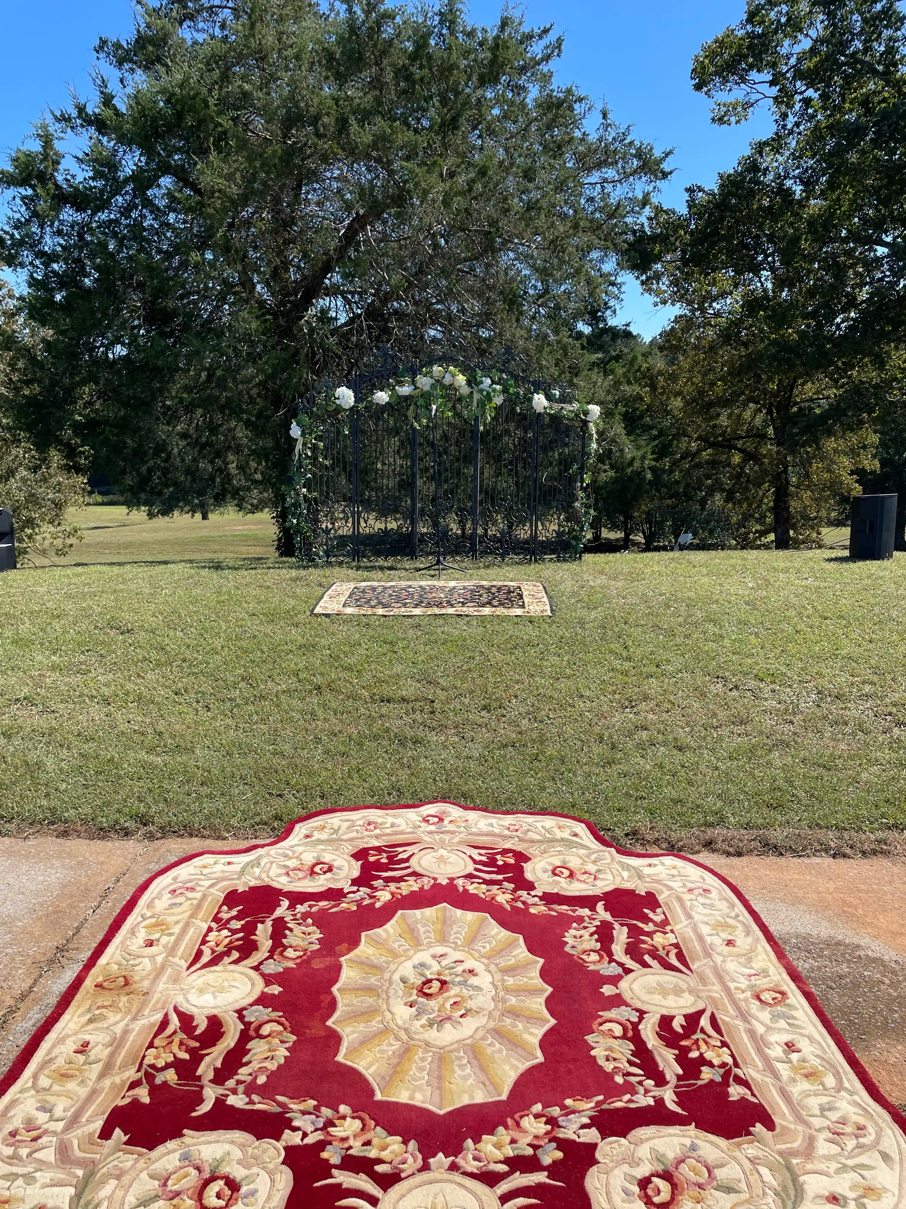 Elegant wedding arch decorated with lush flowers